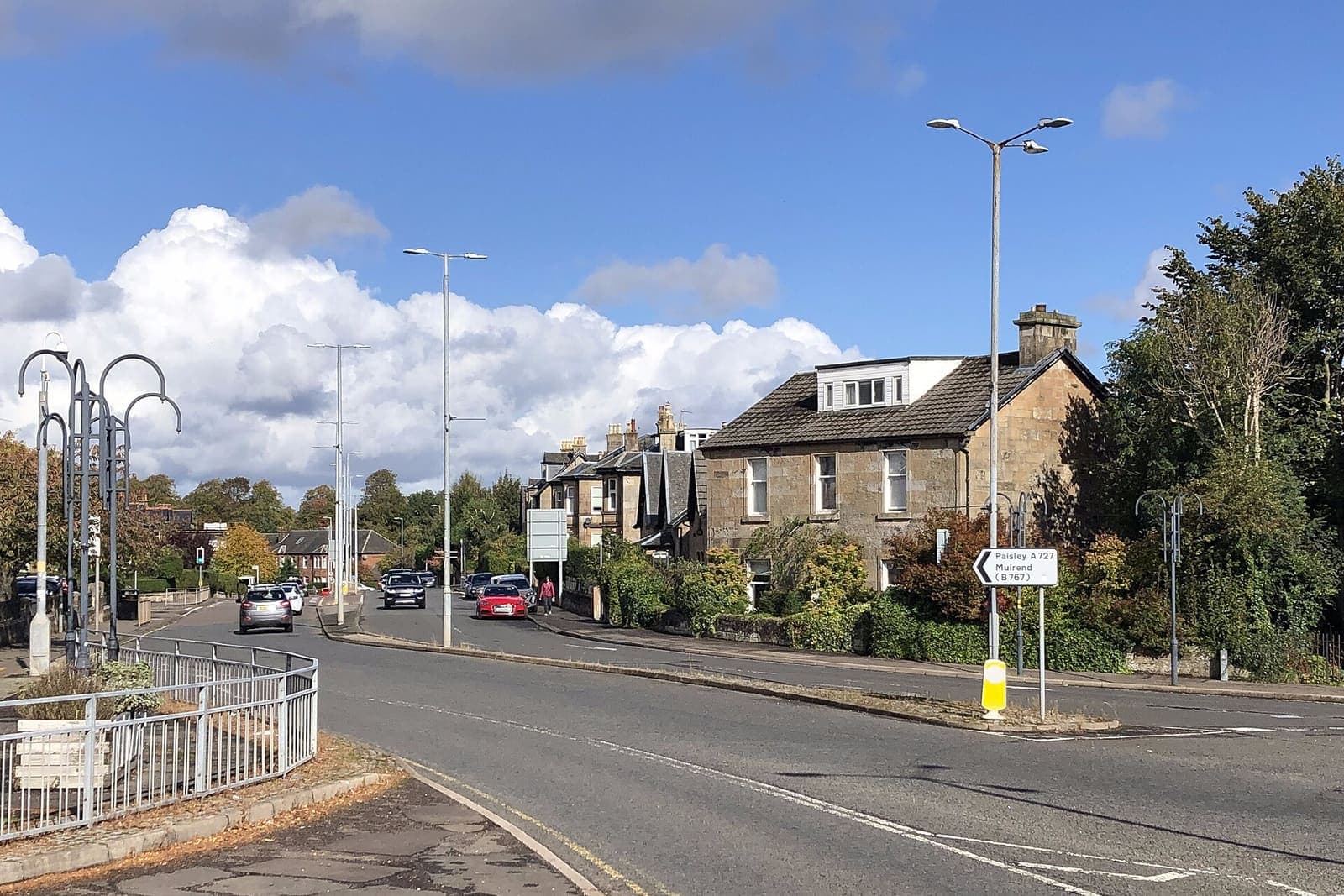 Semi-detached houses on a tree-lined street near Clarkston Toll, Clarkston