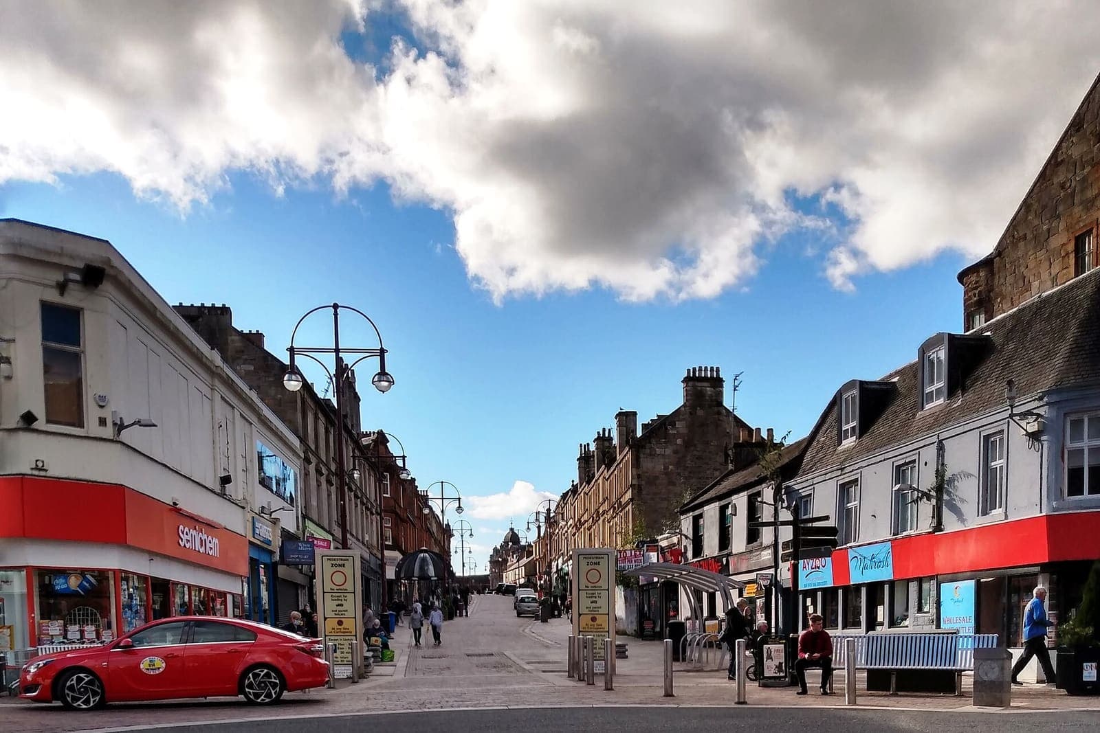 Shops and sandstone buildings on Quarry Street in Hamilton town centre