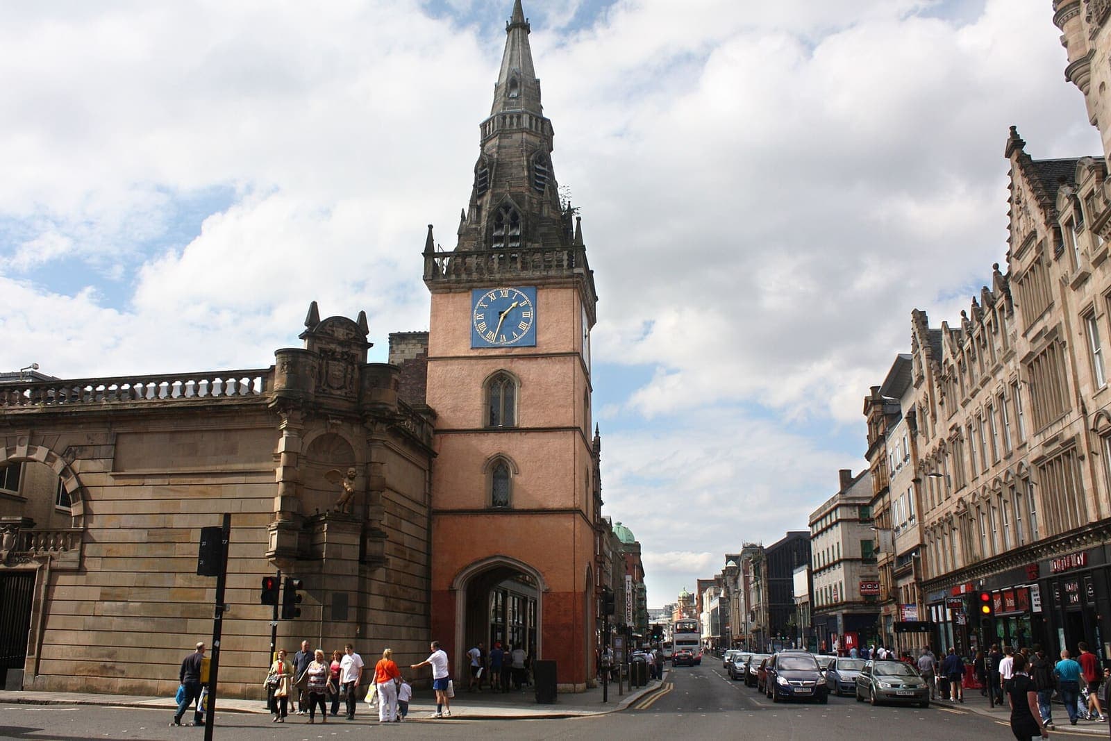 Converted sandstone warehouses and cobbles on Candleriggs in Glasgow's Merchant City