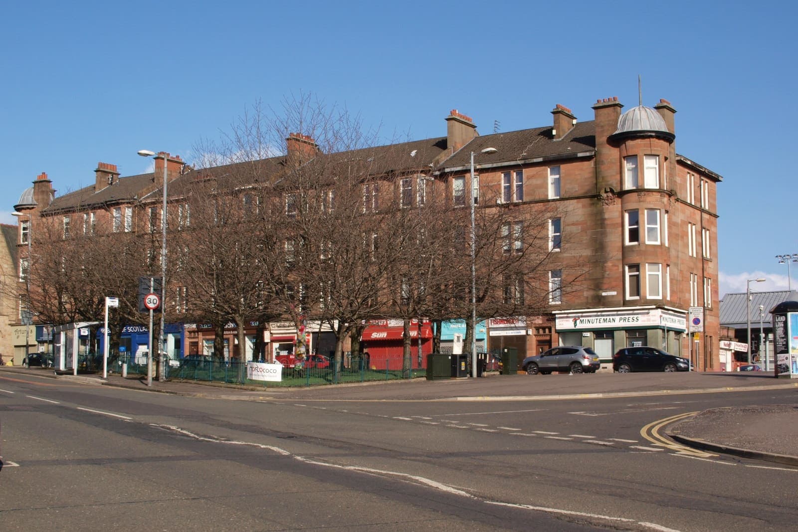 Sandstone tenements on Cathcart Road with Hampden Park behind, Mount Florida